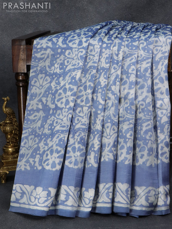 Printed silk saree pastel blue shade   with allover prints and printed border