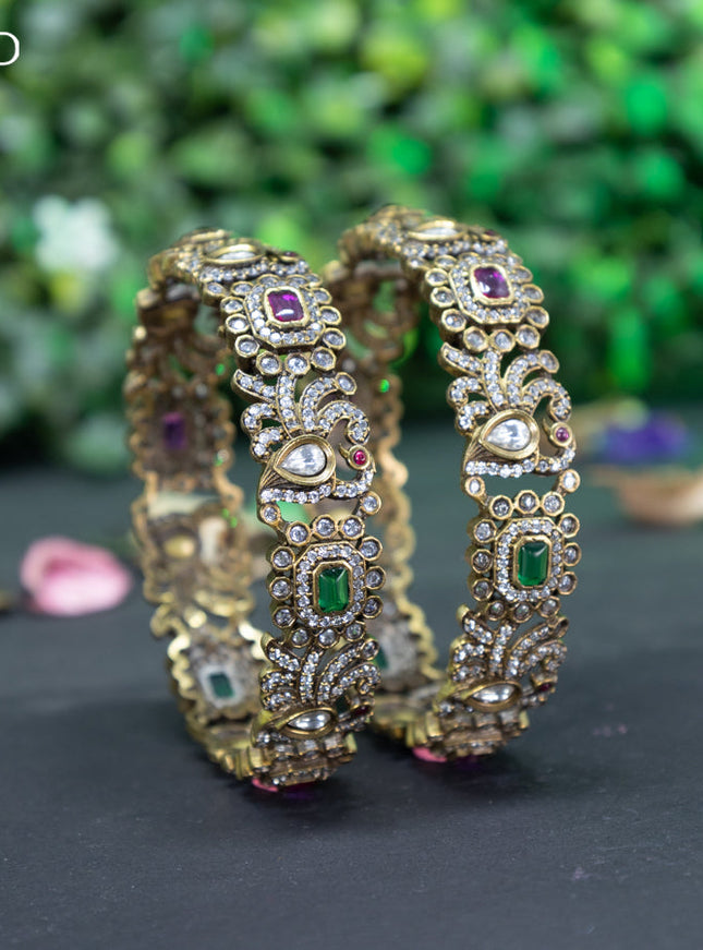 Victorian bangle peacock design with kemp and cz stones