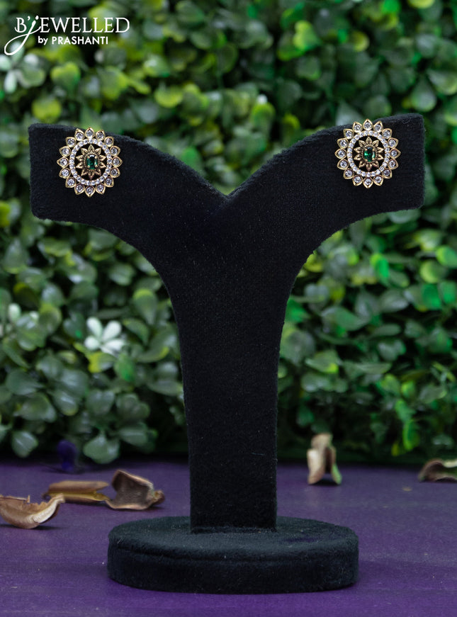 Earrings with emerald and cz stones in victorian finish