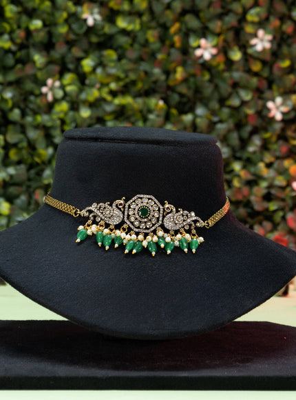 Choker peacock design with emerald & cz stones and pearl hangings in victorian finish