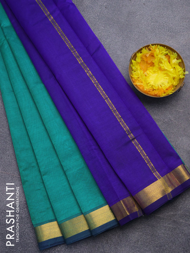 Silk cotton saree teal green and blue with plain body and small zari woven border