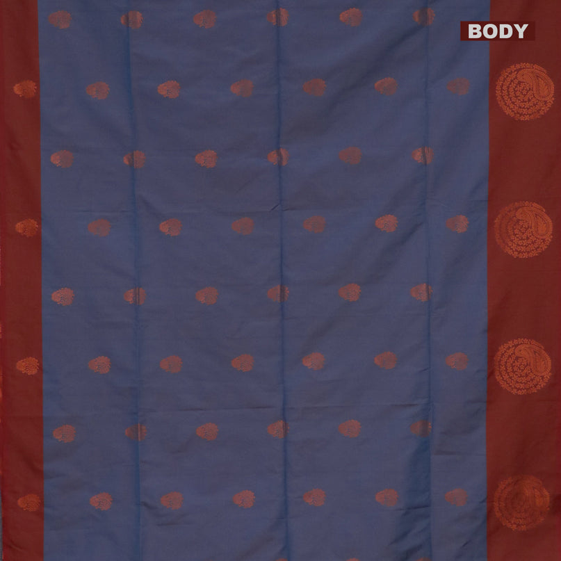 Semi soft silk saree dual shade of blue and dual shade of rust with copper zari woven buttas and zari woven butta border
