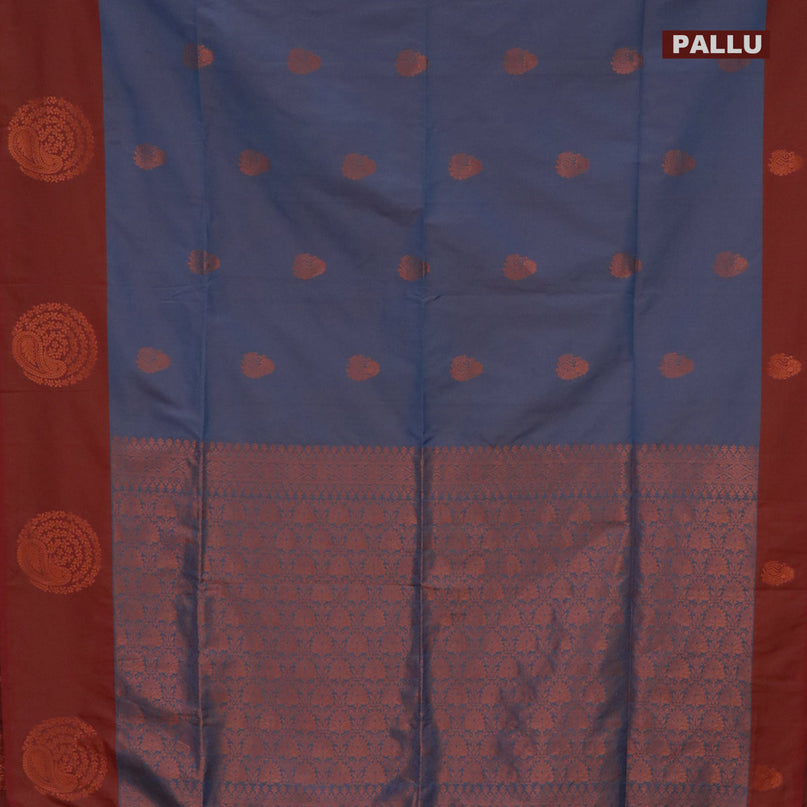 Semi soft silk saree dual shade of blue and dual shade of rust with copper zari woven buttas and zari woven butta border