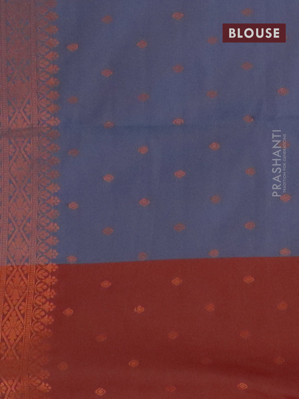 Semi soft silk saree dual shade of blue and dual shade of rust with copper zari woven buttas and zari woven butta border