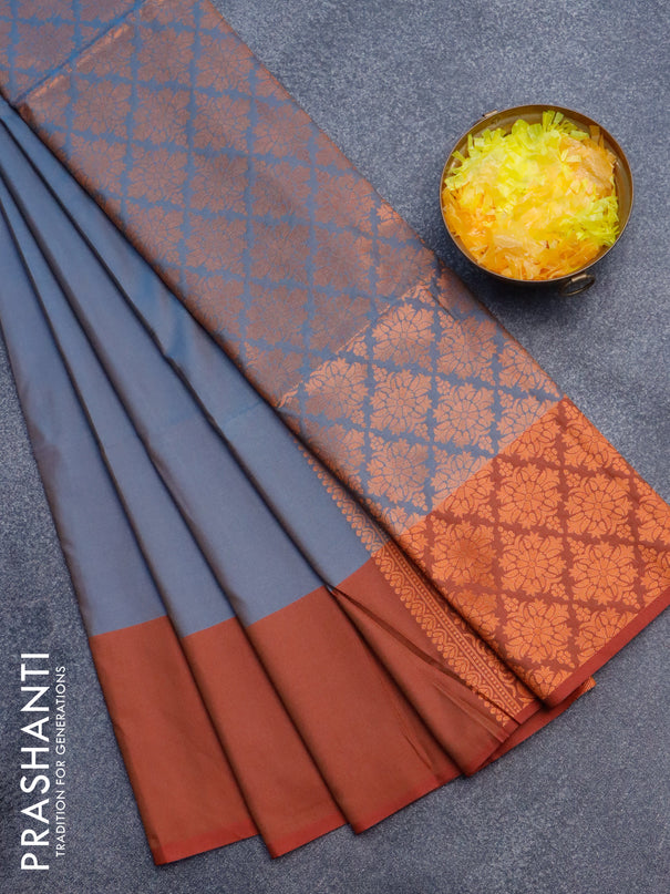 Semi soft silk saree dual shade of grey and maroon with copper zari woven box type buttas and simple border
