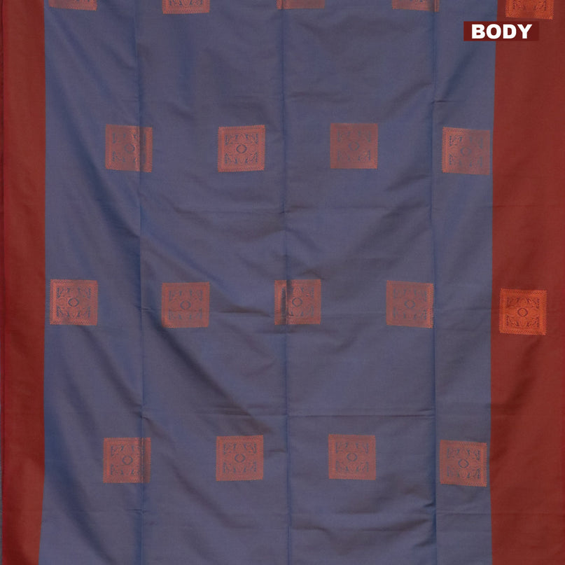 Semi soft silk saree dual shade of grey and maroon with copper zari woven box type buttas and simple border