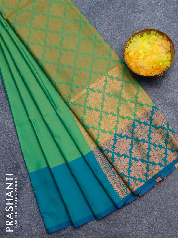 Semi soft silk saree light green and dual shade of bluish green with copper zari woven box type buttas and simple border