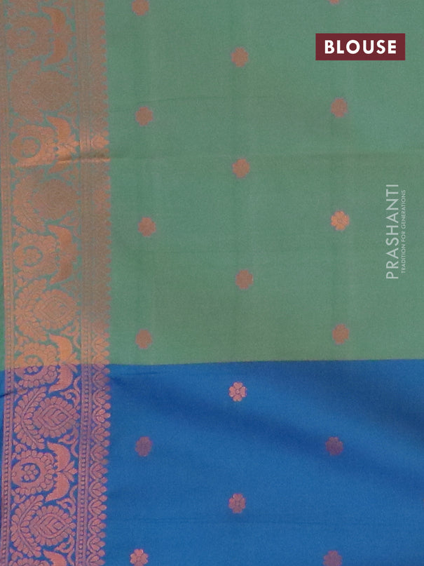 Semi soft silk saree dual shade of green and cs blue with copper zari woven box type buttas and simple border