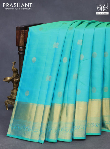 Pure kanchipuram silk saree dual shade of teal green and pink with zari woven buttas and zari woven border