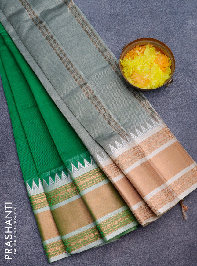 Semi mangalgiri silk saree green and grey with plain body and temple design copper zari woven border