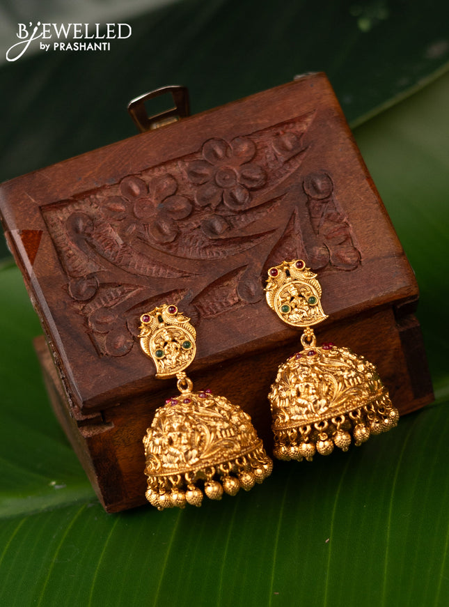 Antique jhumka lakshmi design with kemp stones and golden beads hanging