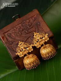 Antique jhumka lakshmi design with kemp stones and pink beads hanging