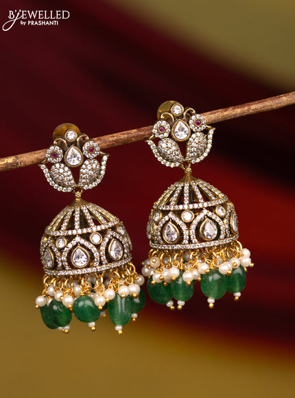 Victorian finish jhumka floral design with cz stone and green beads hangings