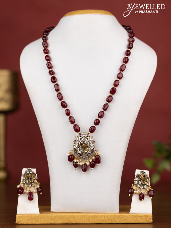 Beaded necklace ganesha design with pink kemp & cz stones and maroon beads hangings