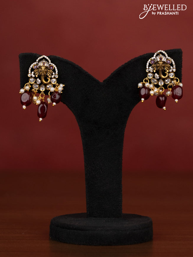 Beaded necklace ganesha design with pink kemp & cz stones and maroon beads hangings