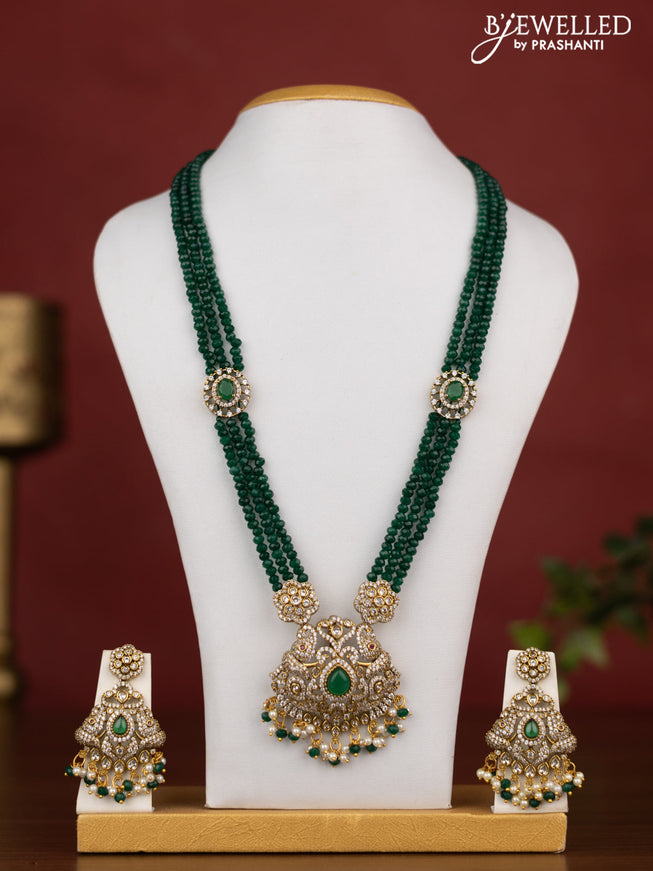 Beaded triple layer green necklace with kemp & cz stones and pearl hangings