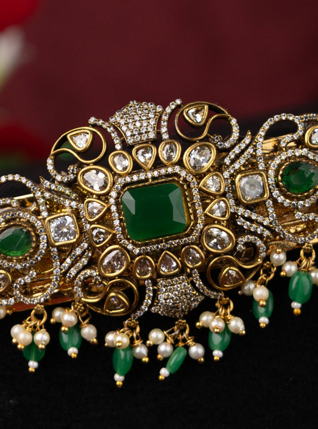 Antique self embosse hip belt with green kemp & cz stones and pearl & beads hanging