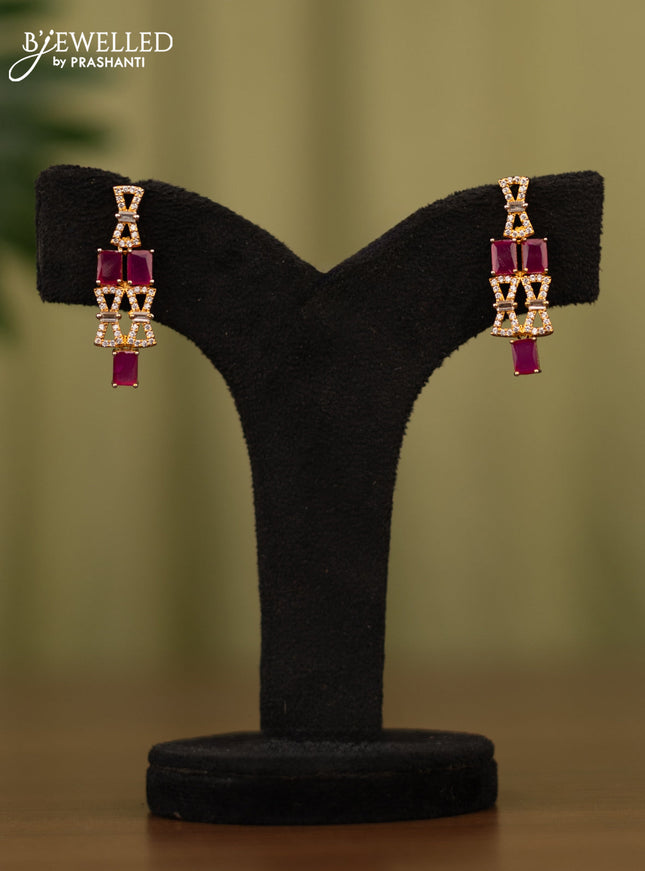 Zircon earrings with pink kemp & cz stones in gold finish