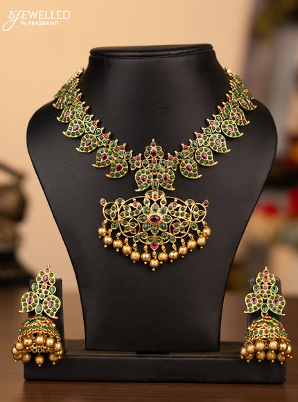 Antique necklace manga pattern with kemp stones and golden beads hanging