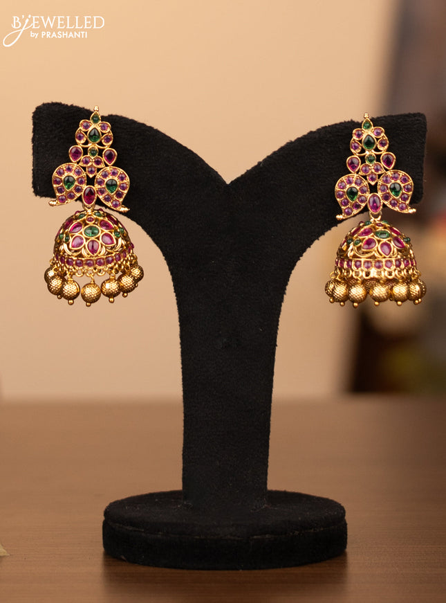 Antique necklace manga pattern with kemp stones and golden beads hanging