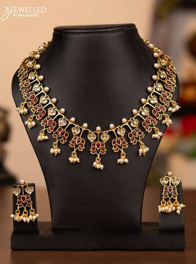 Antique necklace floral design with kemp & kundan stones and pearl hangings