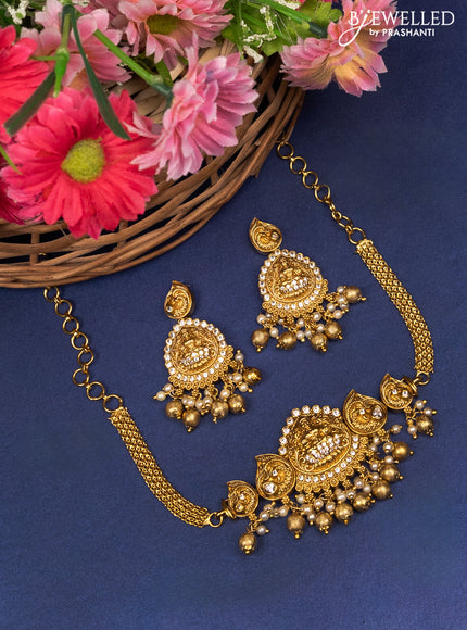 Antique choker lakshmi design with cz stones and pearl & golden beads hanging