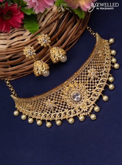 Zircon choker floral design with cz stones and pearl hangings in gold finish