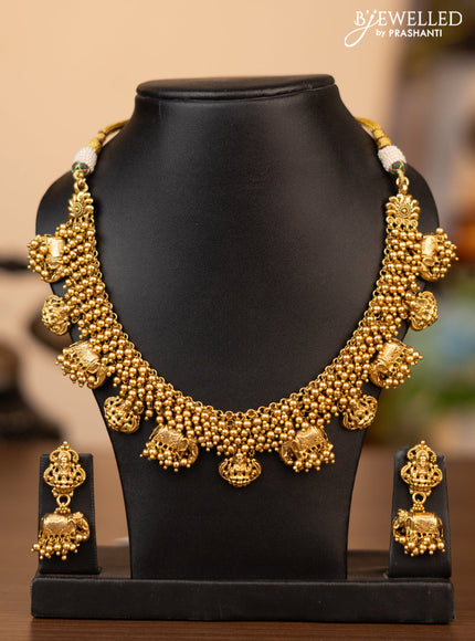 Antique necklace with lakshmi & elephant design and golden beads hanging