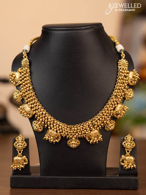 Antique necklace with lakshmi & elephant design and golden beads hanging