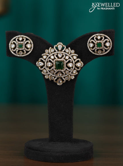 Victorian finish pendant set with emerald and cz stone