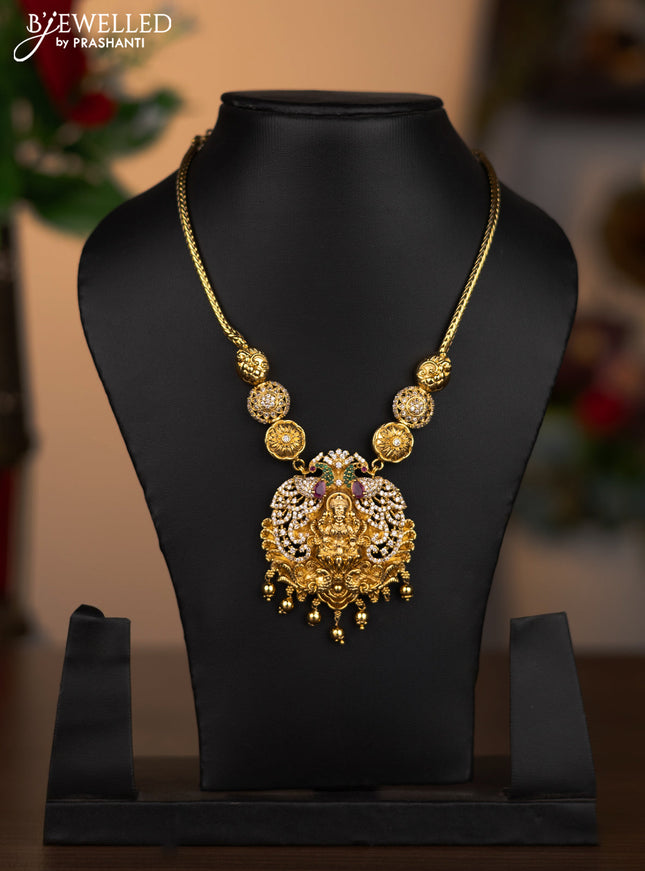Antique necklace lakshmi pendant with kemp & cz stones and golden beads hanging without earrings
