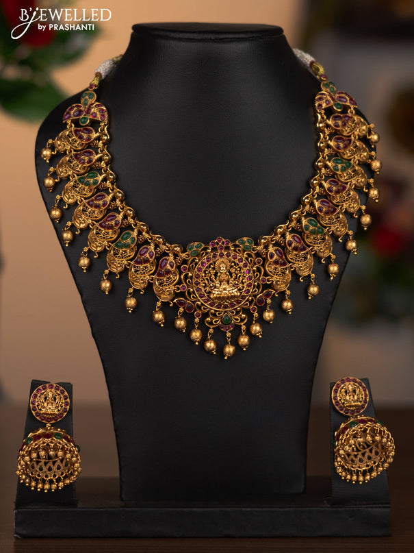 Antique necklace lakshmi design with kemp stones and golden beads hanging