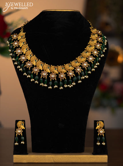 Antique necklace peacock design with kemp & kundan stones and pearl & green beads hanging