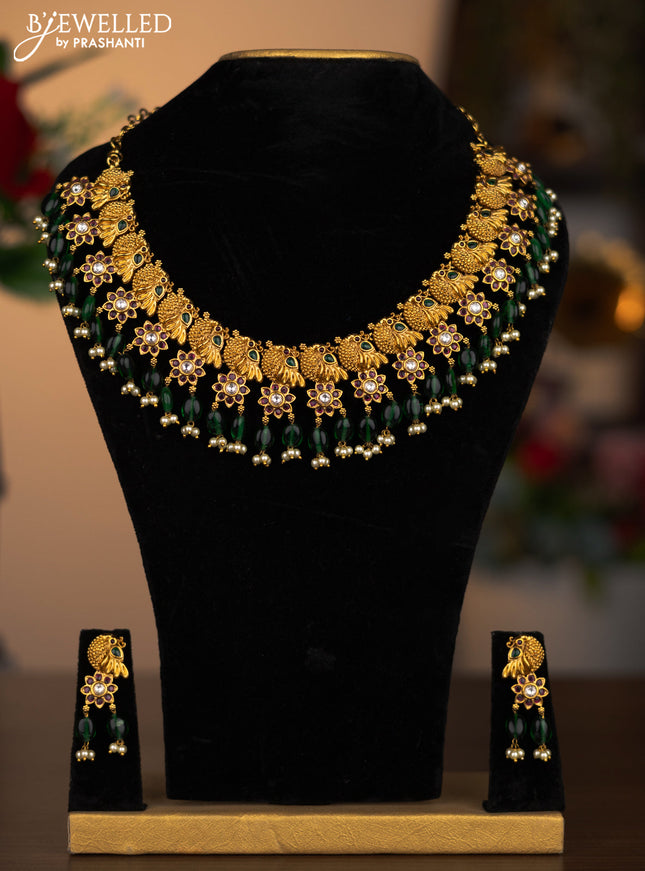 Antique necklace peacock design with kemp & kundan stones and pearl & green beads hanging