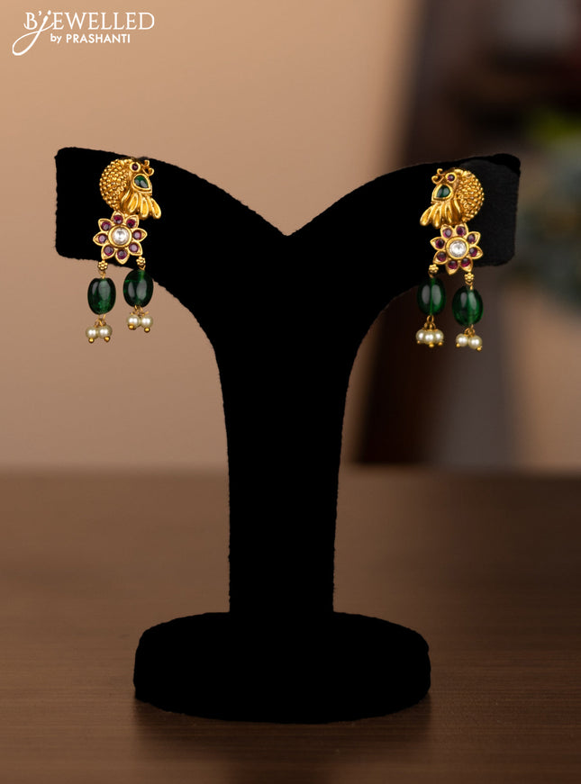 Antique necklace peacock design with kemp & kundan stones and pearl & green beads hanging