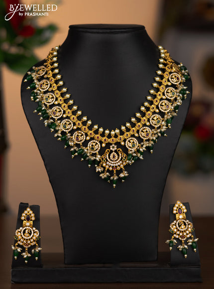 Antique necklace with kemp & cz stones and pearl & green beads hanging