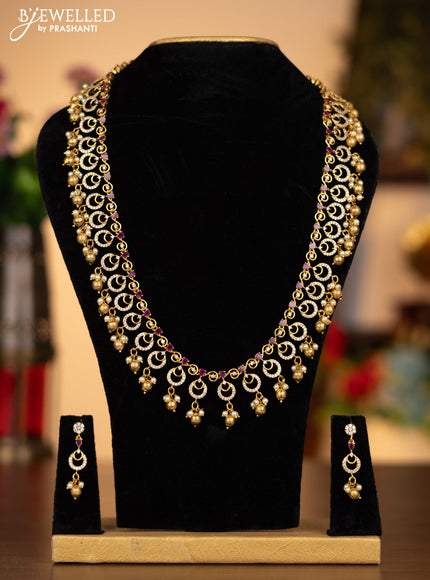 Antique haaram with pink kemp & cz stones and pearl & golden beads hanging
