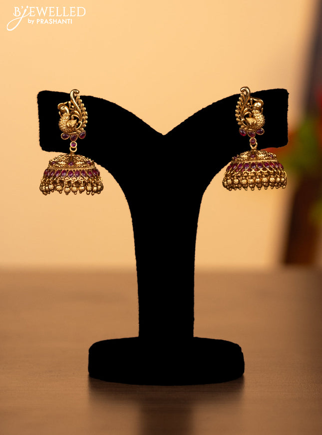 Antique haaram lakshmi & peacock design with pink kemp stones and golden beads hanging