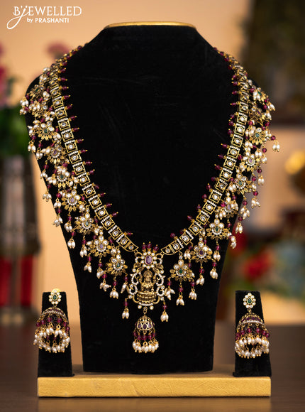 Antique haaram lakshmi pendant with kemp & cz stones and pearl & pink beads hanging