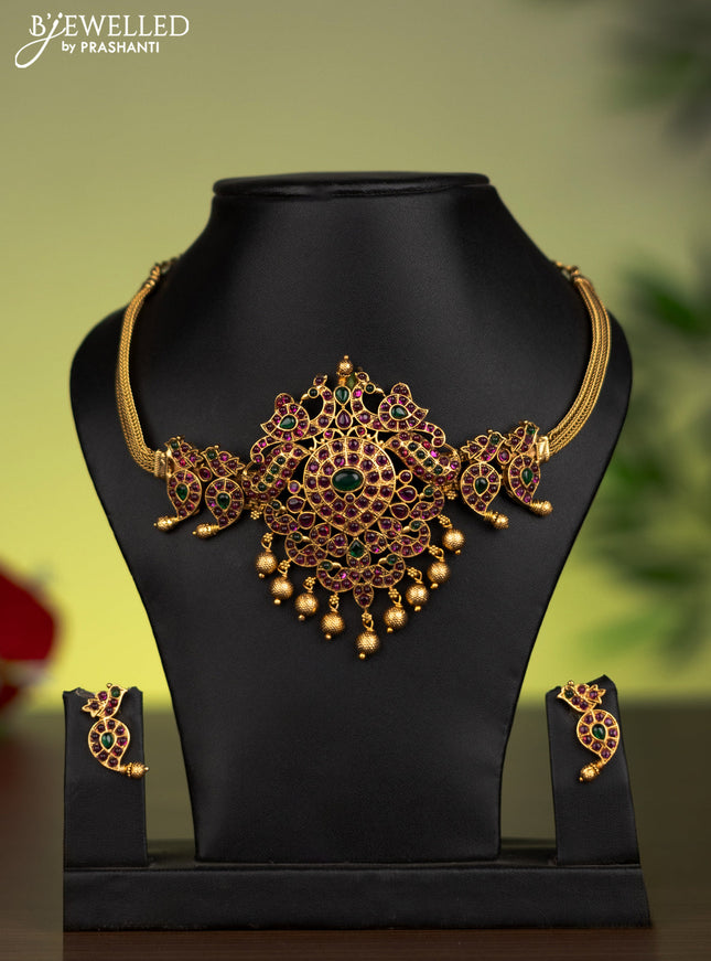 Antique attigai necklace manga pattern with kemp stones and golden beads hanging