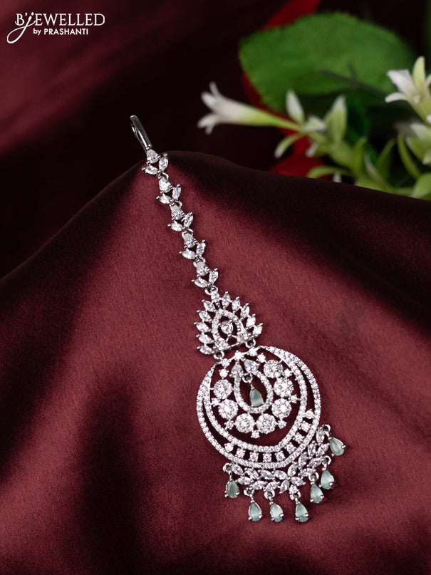 Zircon maang tikka with mint green & cz stones and hangings
