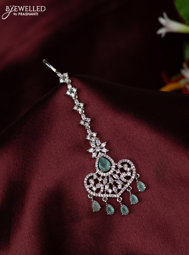 Zircon maang tikka with mint green & cz stones and hangings