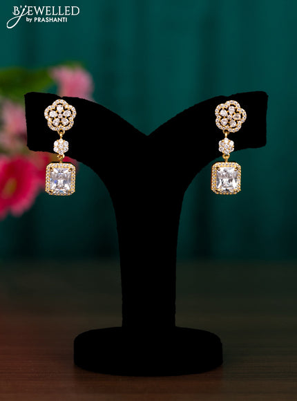 Zircon floral design earrings with cz stones in golden finish