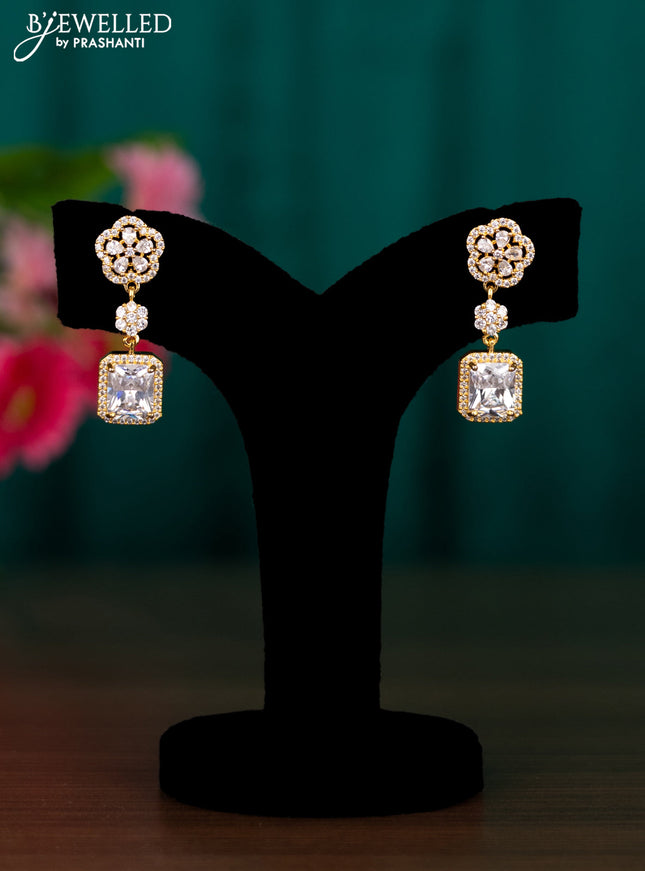 Zircon floral design earrings with cz stones in golden finish