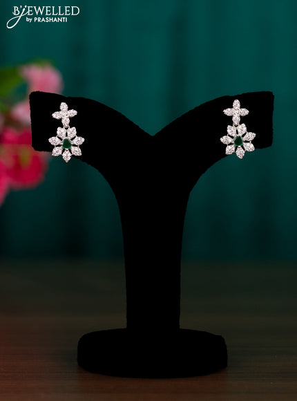Zircon floral design earrings with emerald and cz stones