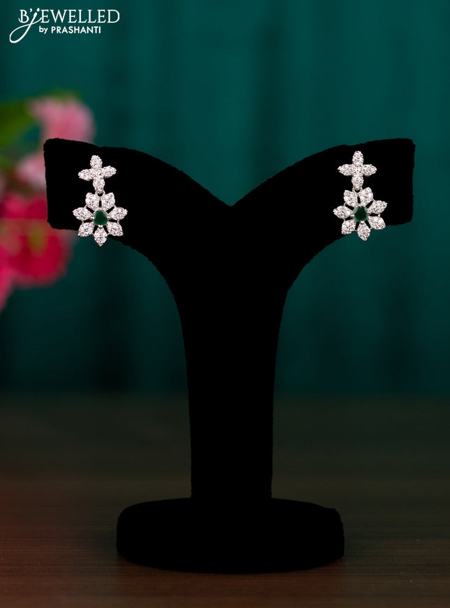 Zircon floral design earrings with emerald and cz stones