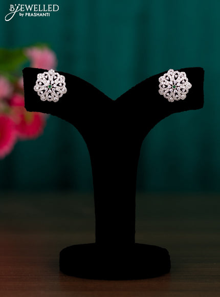 Zircon floral design earrings with emerald and cz stones