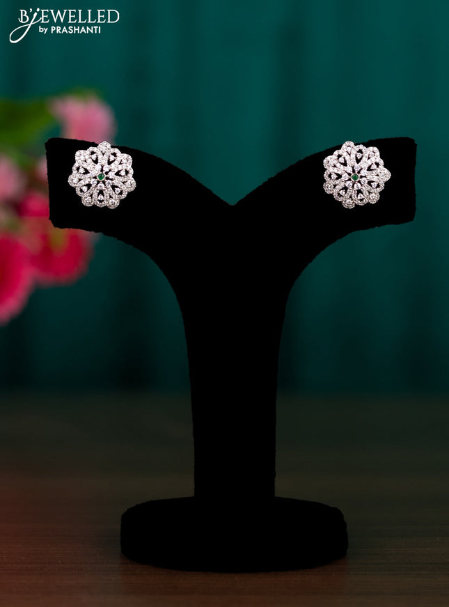 Zircon floral design earrings with emerald and cz stones