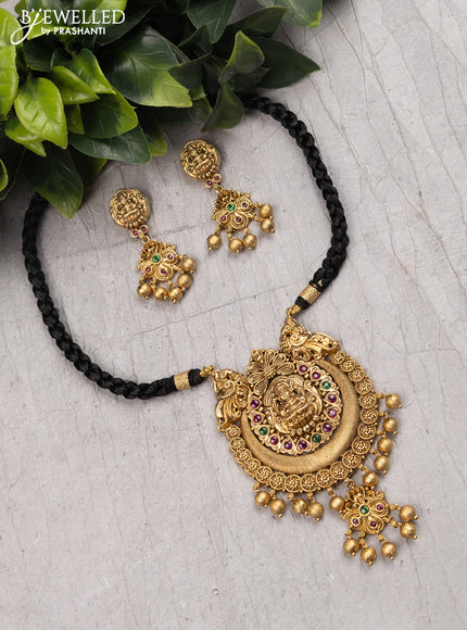 Black thread necklace with lakshmi pendant kemp stone and golden beads hangings