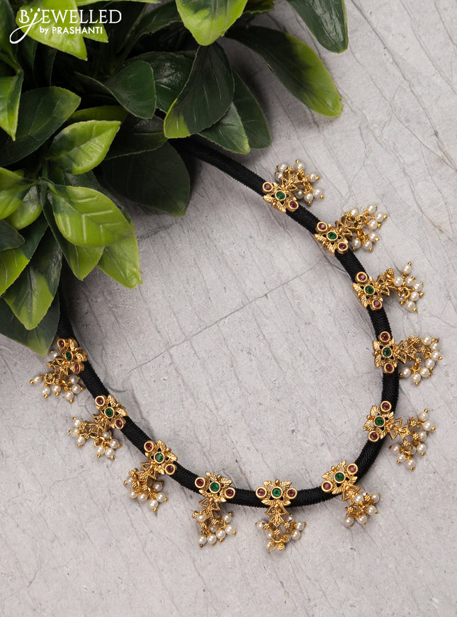 Black thread necklace with kemp stone and pearl hangings without earrings